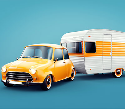Beginner's guide to caravan holidays – a Mini car towing a retro caravan Beginner's guide to caravan holidays – a Mini car towing a retro caravan