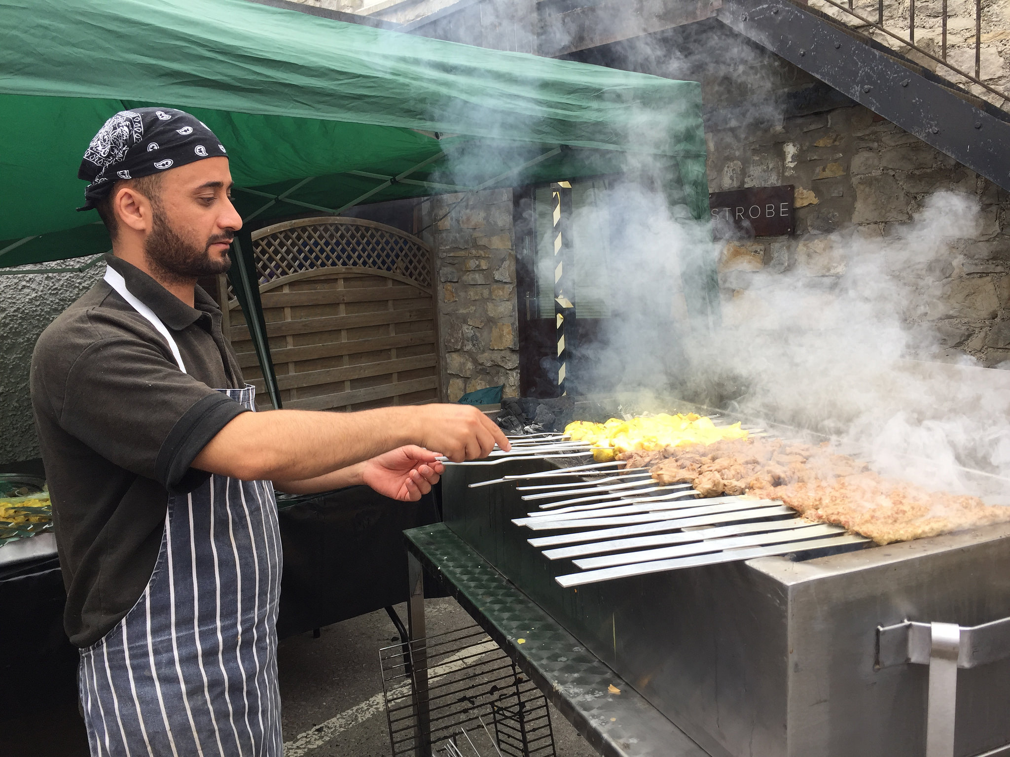 A chef cooks kebabs at Cowbridge Food Festival