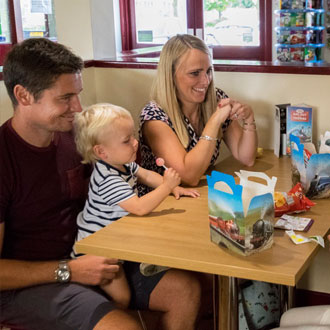 Family sat down at Cleethorpes Coast Light Railway Family sat down at Cleethorpes Coast Light Railway
