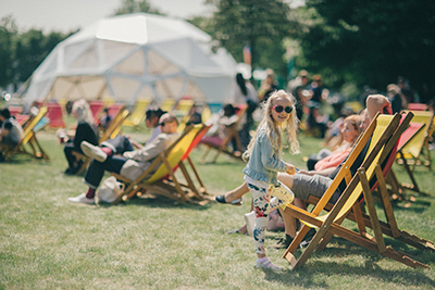 Families enjoying London's favourite Festival - Greenwich Peninsula's seminal festival Urban Village Fate May 2022
