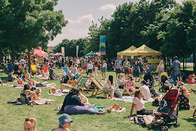 Families enjoying London's favourite Festival - Greenwich Peninsula's seminal festival Urban Village Fate May 2022